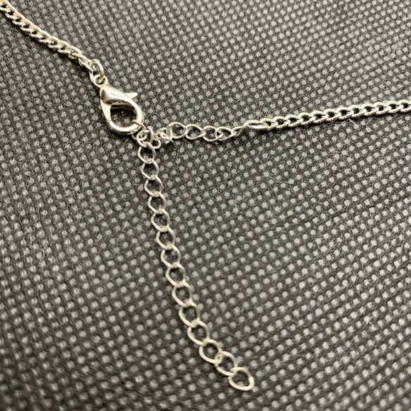 Silver Infinity Knot with Tassel Necklace - Picture 5 of 5